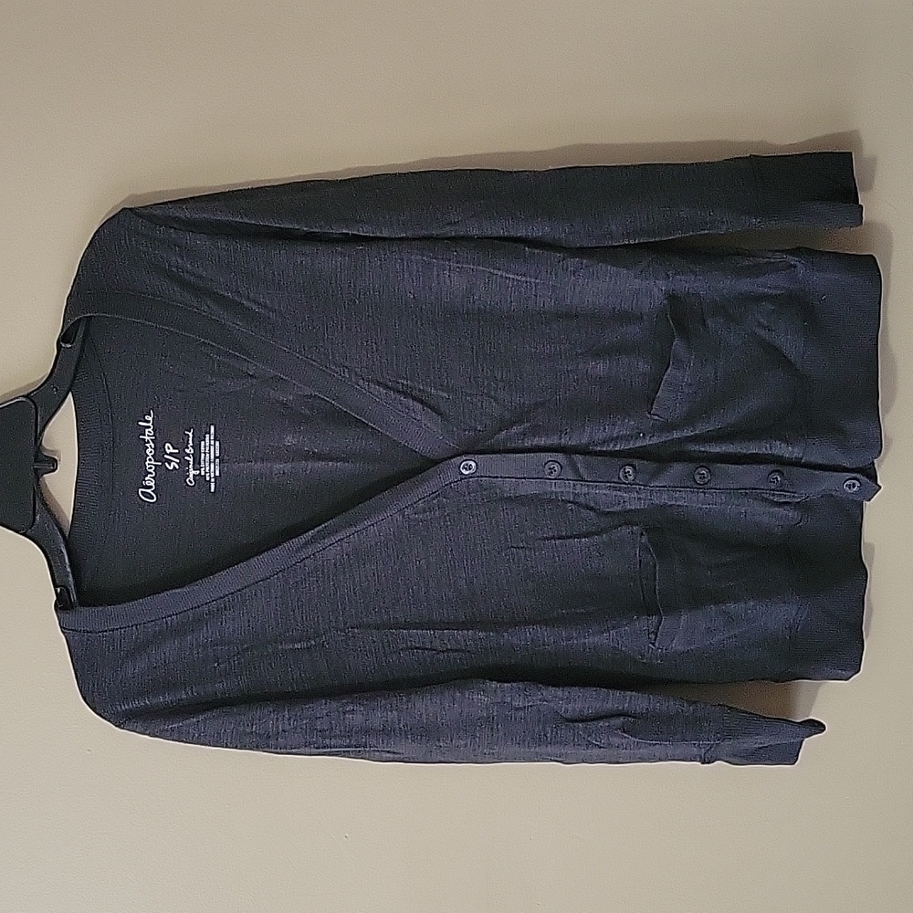 A small charcoal gray Aeropostale light weight cardigan
